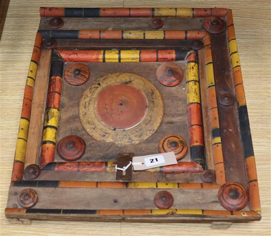 An Afghan painted wood window panel width 38cm height 43cm